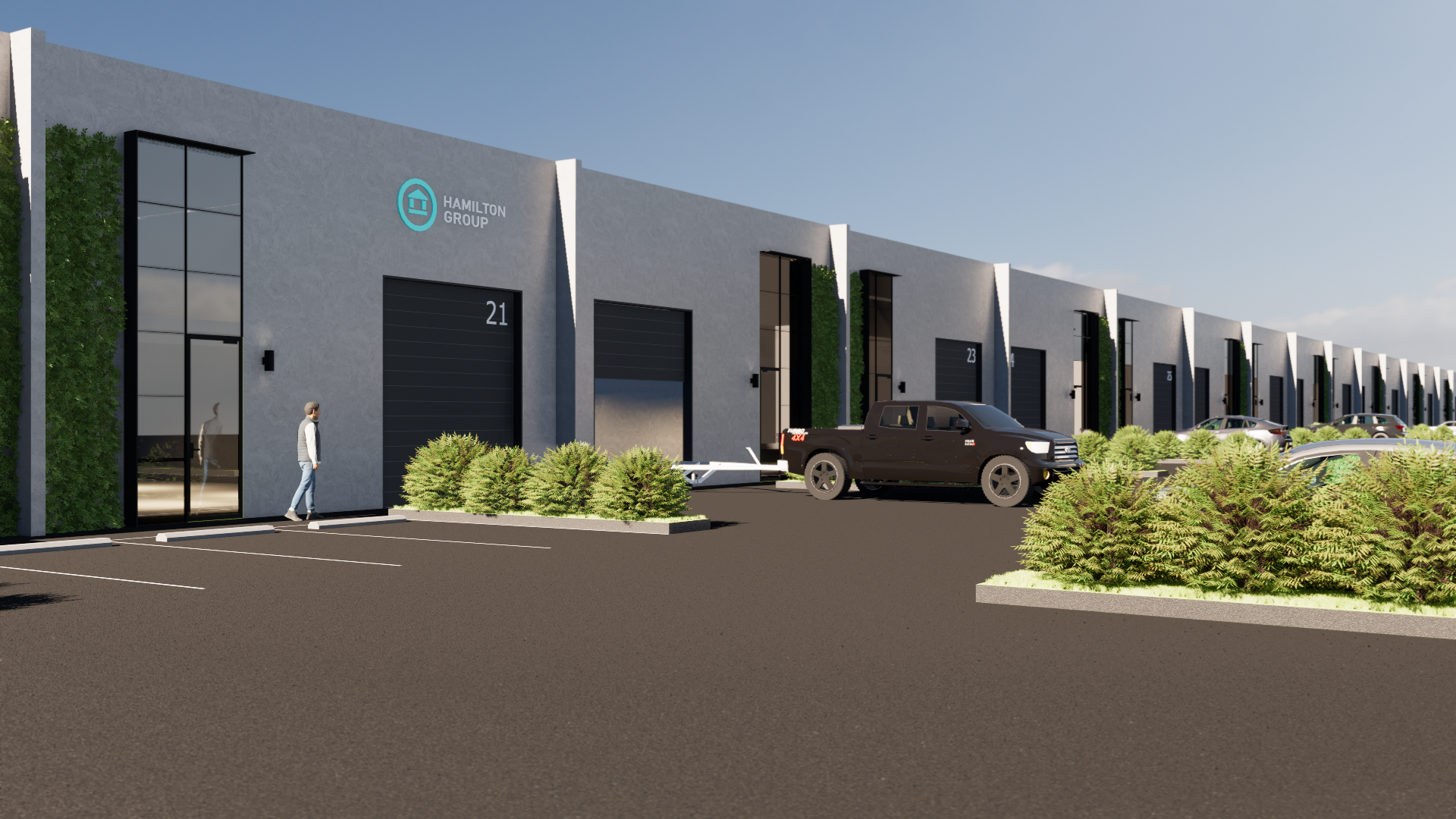 Modern industrial warehouse units for lease at Geelong Power Station redevelopment, featuring Unit 21 with ample parking, landscaping, and contemporary design by Hamilton Group.