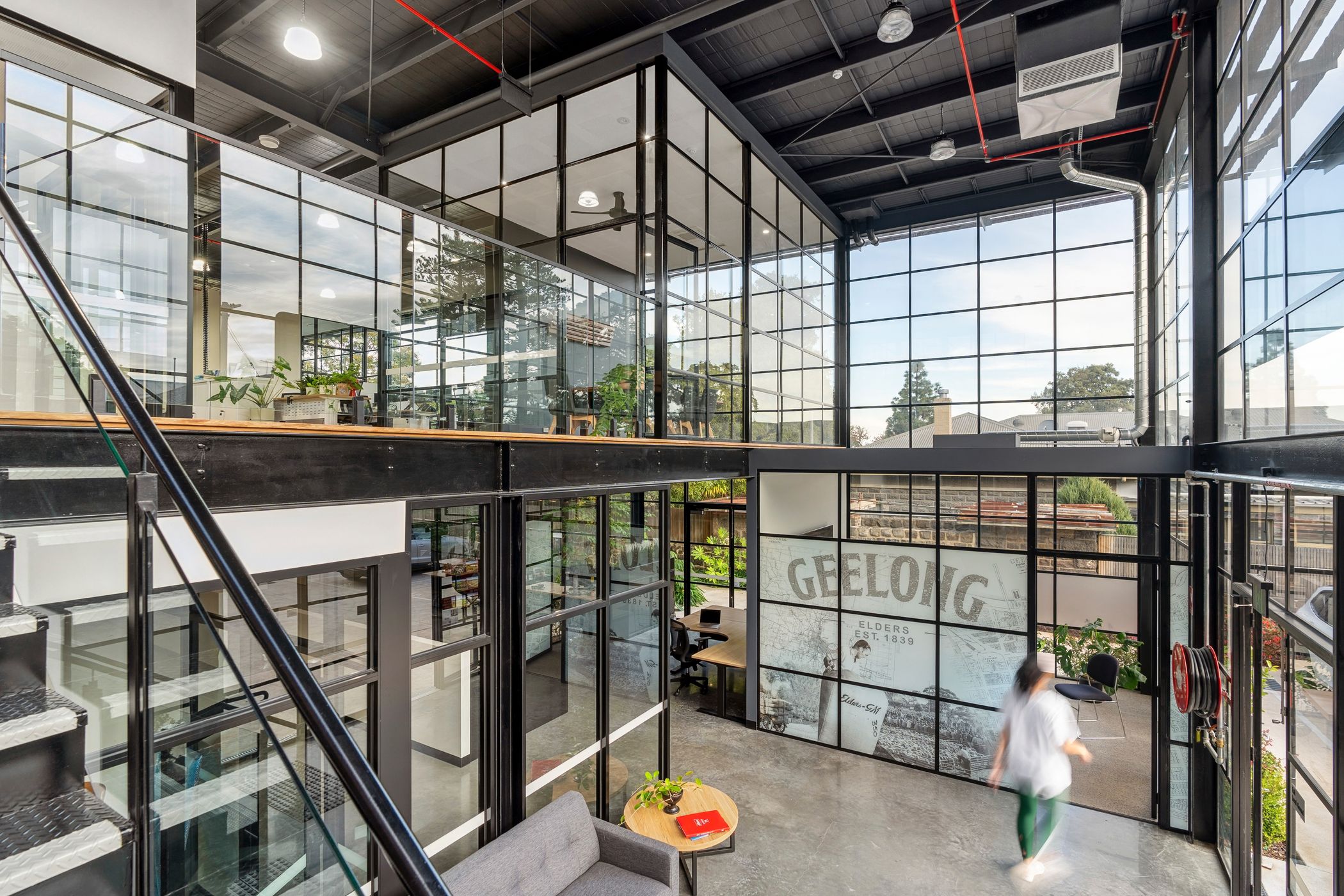 Custom Steel work done - Structural steel for the building itself, T-bar window petition walls, Steel staircase, Steel handrails, Mezzanine floor, Steel doors & door frames, External T-bar window walls.