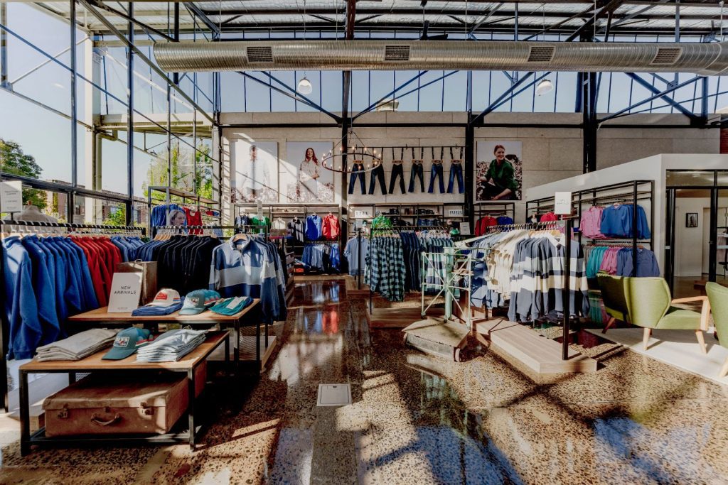RB Sellars retail store in Geelong featuring a modern retail fitout with timber finishes, open shelving and menswear apparel on display.