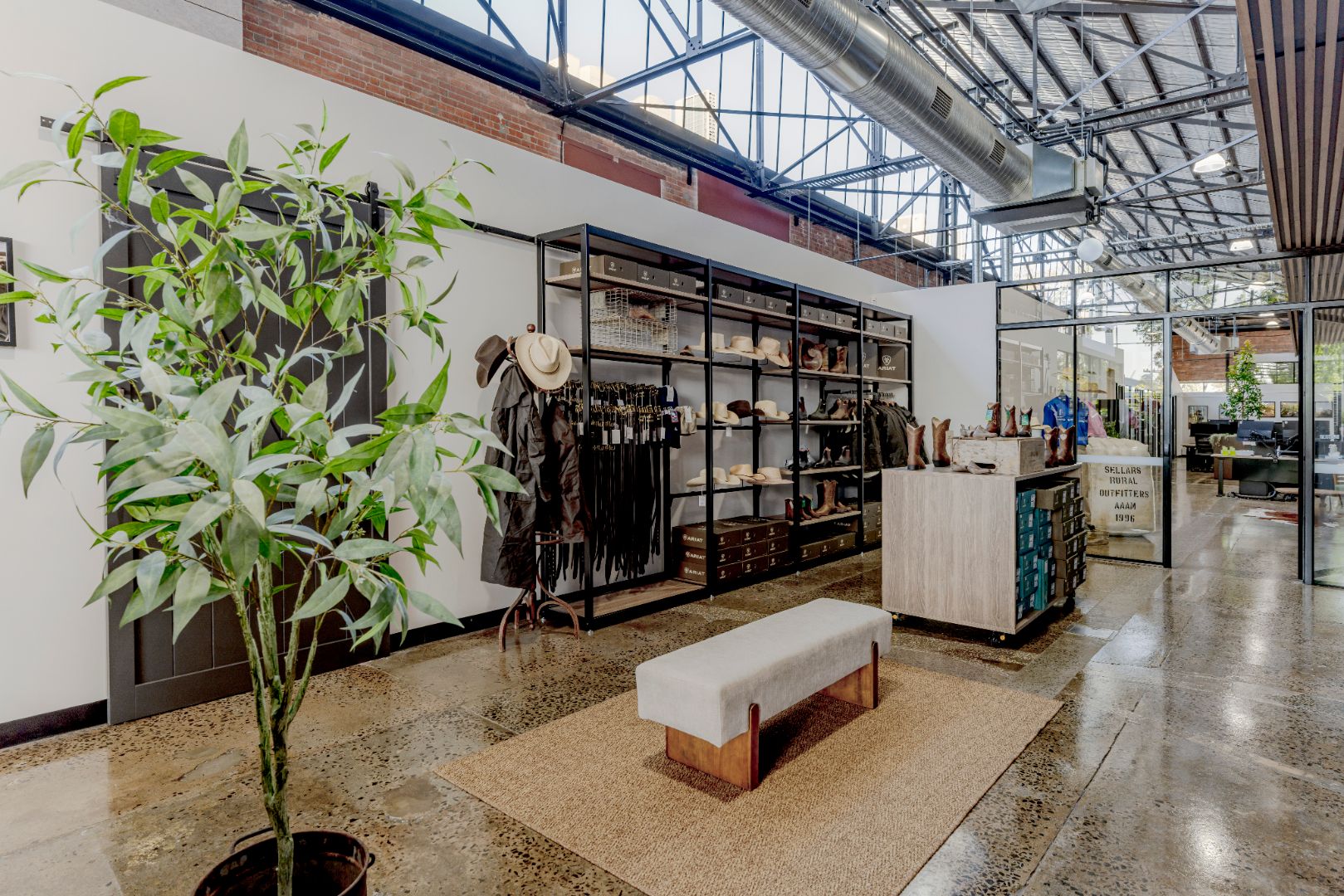 RB Sellars retail store in Geelong featuring a modern retail fitout with timber finishes, open shelving and apparel on display.
